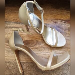 Gold Stuart Weitzman size 7 sandals